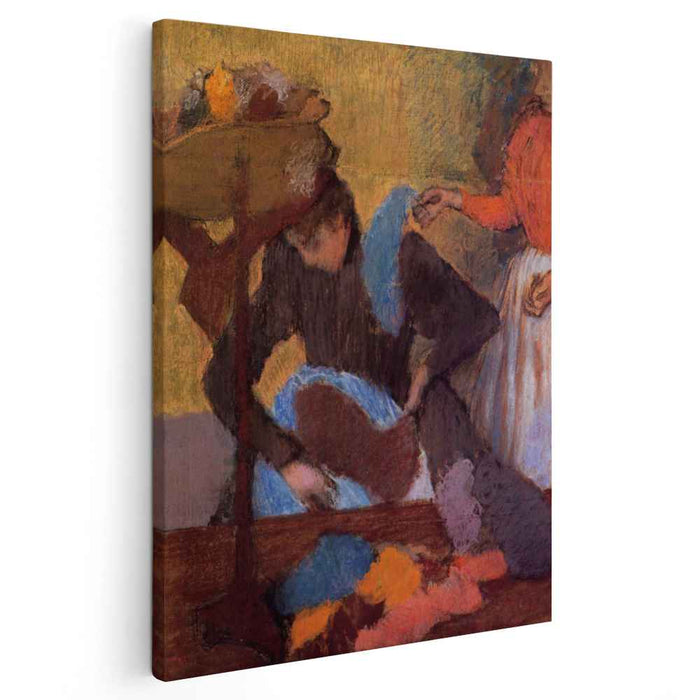 At the Milliner's (1910) by Edgar Degas