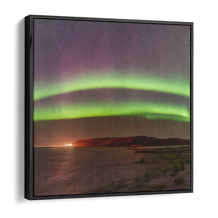 Celestial Serenity Encounters Calm Reflections: Captivating Northern Lights Over Tranquil Waters