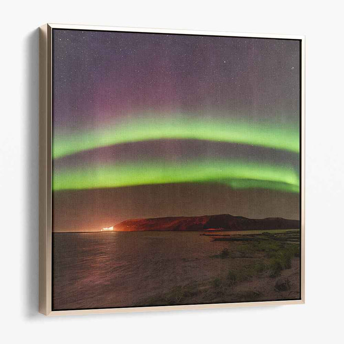 Celestial Serenity Encounters Calm Reflections: Captivating Northern Lights Over Tranquil Waters