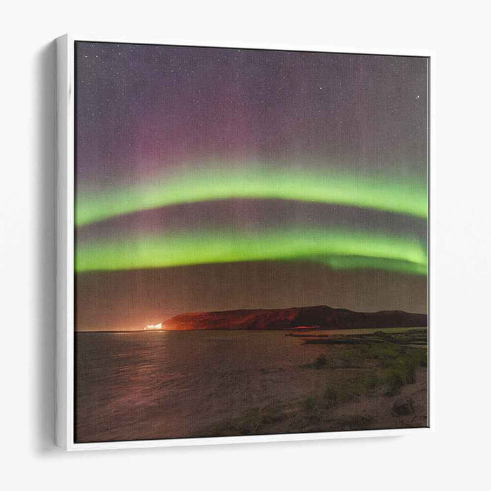 Celestial Serenity Encounters Calm Reflections: Captivating Northern Lights Over Tranquil Waters