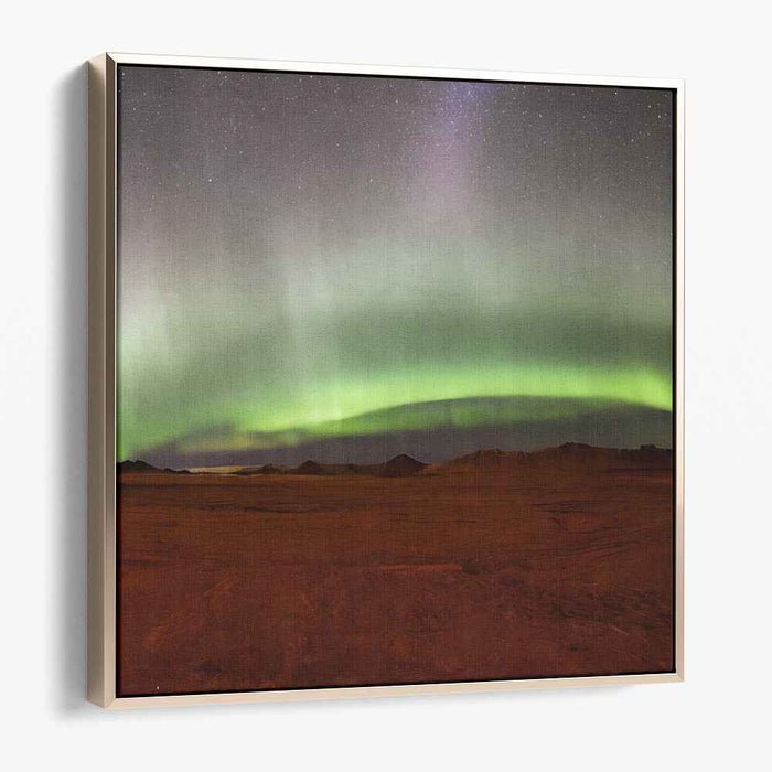 Ethereal Sandstorm Glow: Aurora Borealis Over Desert Landscape Canvas Art Print