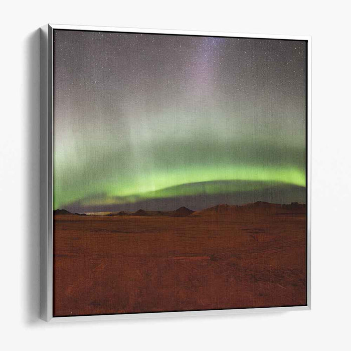 Ethereal Sandstorm Glow: Aurora Borealis Over Desert Landscape Canvas Art Print