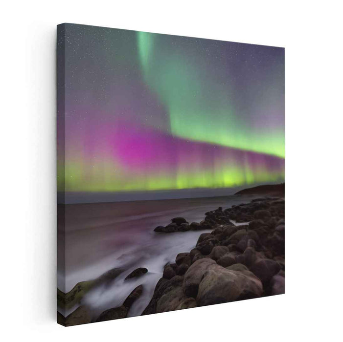 Ethereal Night: Northern Lights Over Coastal Landscape Canvas Art Print
