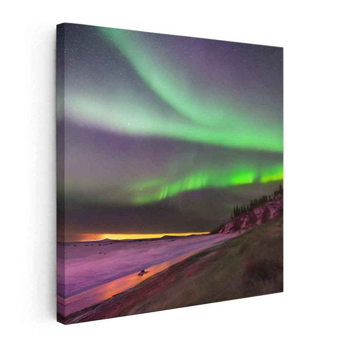 Enchanted Frosty Lightscape: Captivating Aurora Borealis Over Snowy Landscape Canvas Art