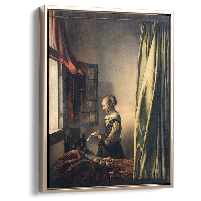 Girl Reading a Letter at an Open Window (1657) by Johannes Vermeer