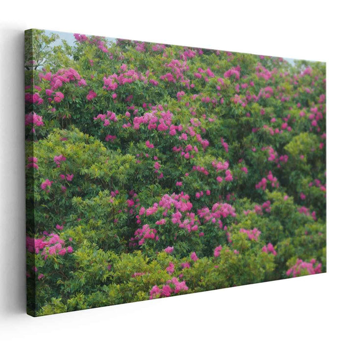 Floral Mirage in Eden: Lush Green and Radiant Pink Floral Landscape Canvas Art Print