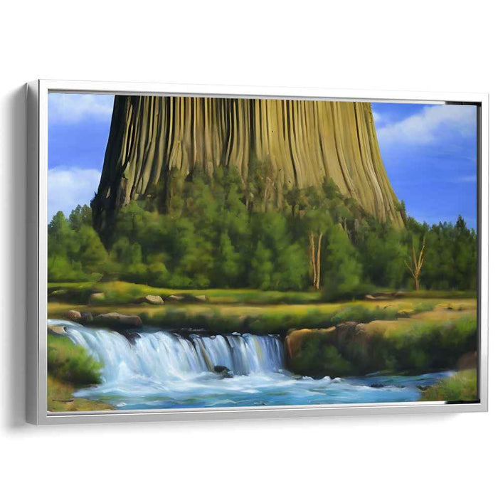 Majestic Natural Monument: Serene Landscape with Towering Rock Formation and Waterfall