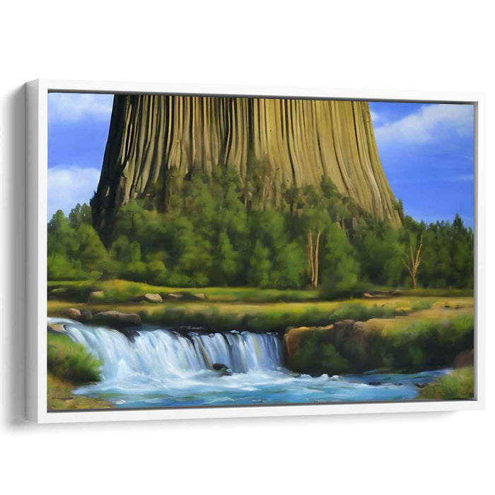 Majestic Natural Monument: Serene Landscape with Towering Rock Formation and Waterfall