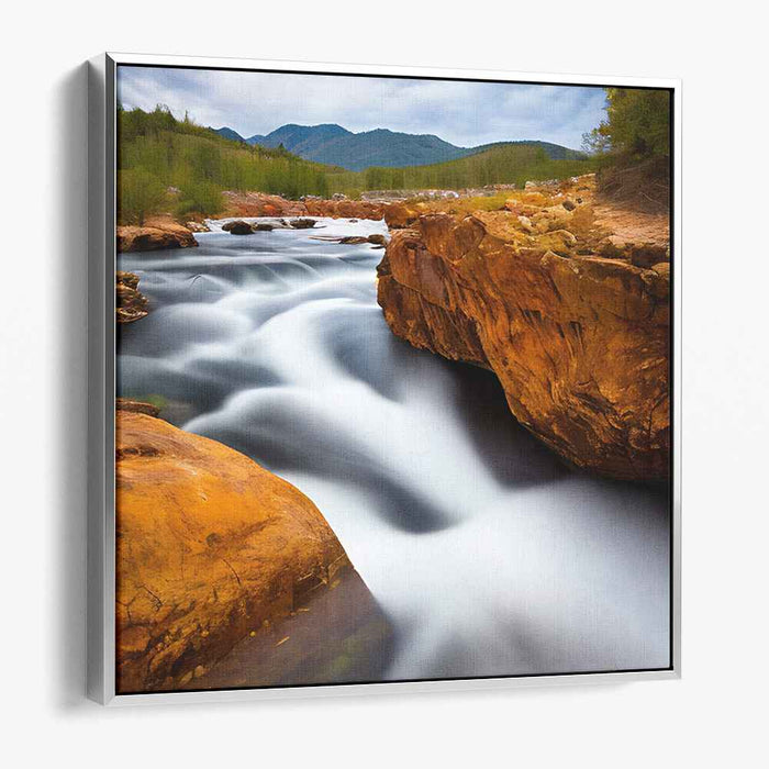 Ripple Dance Among Stone Giants: Serene River Flowing Through Rugged Terrain